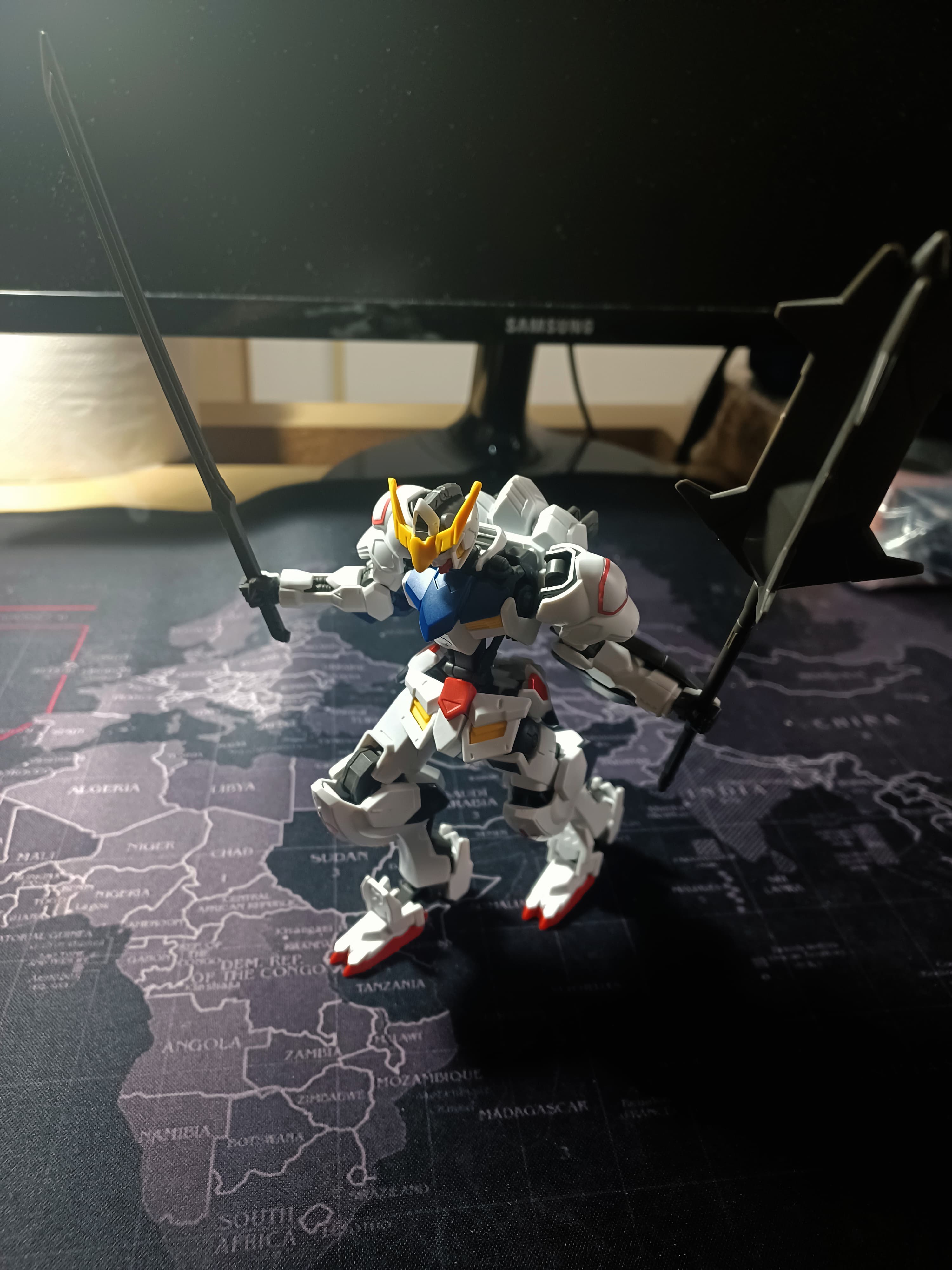 Painterly illustration of Gundam Barbatos in a dynamic pose