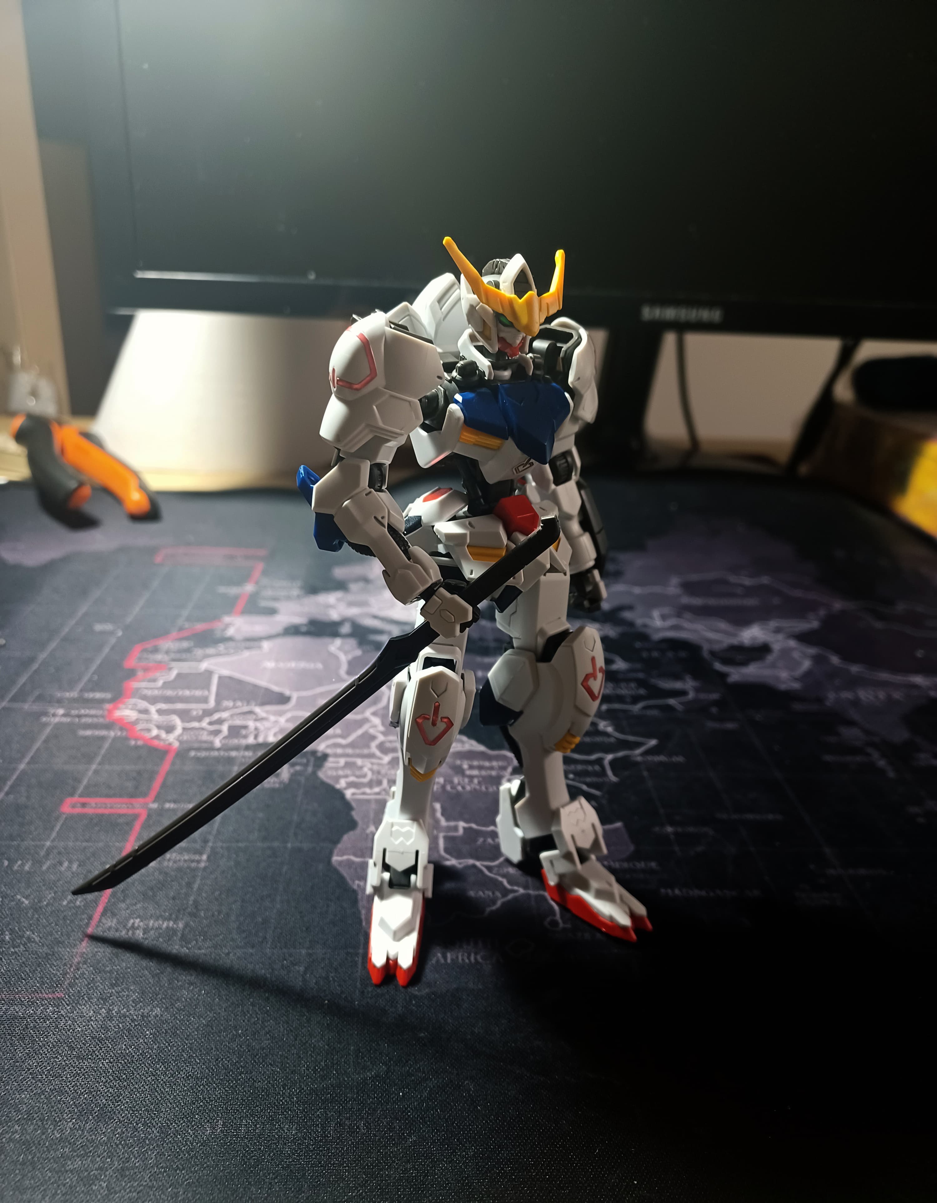 Painterly illustration of Gundam Barbatos in a dynamic pose